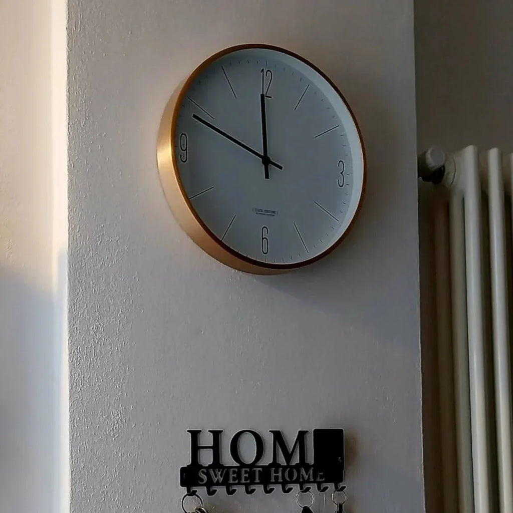 Minimalist Wall Clock with Timeless Elegance and Wood Accents