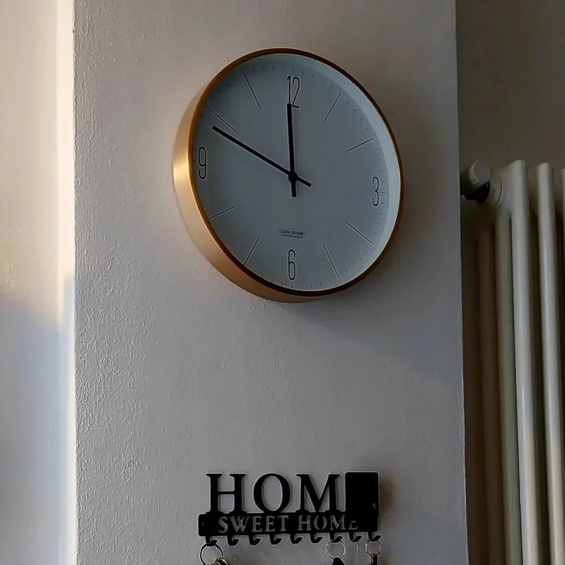 Minimalist Wall Clock with Timeless Elegance and Wood Accents
